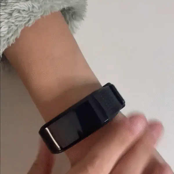 gif of a woman using Vital Fit Track and browsing its features