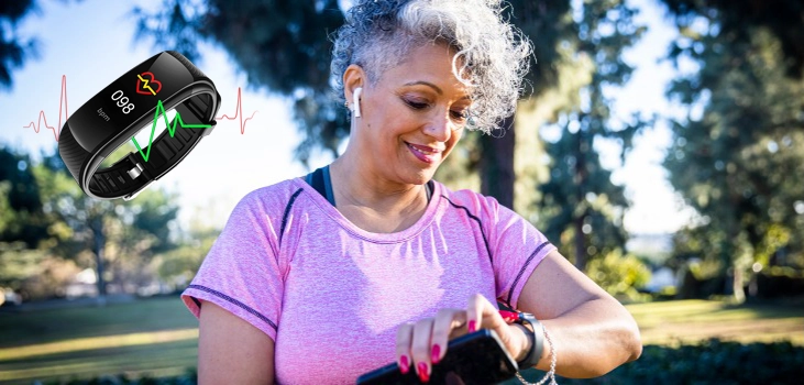 senior woman checking her heart rate using her health tracker